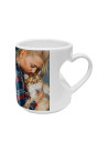 Tasse blanche à poignée en forme de coeur